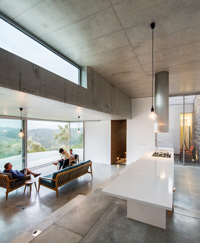 Gateira concrete house designed in harmony with dramatic landscape (1)