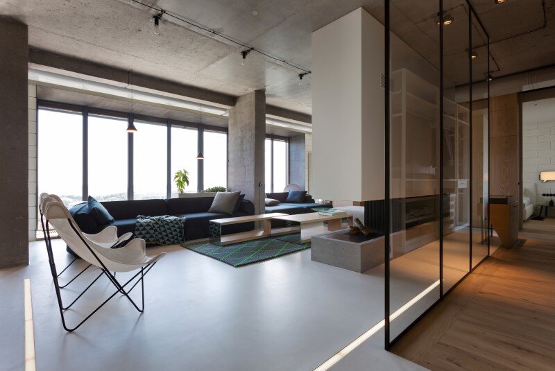 Penthouse with concrete ceiling and a glass-wall windows (2)