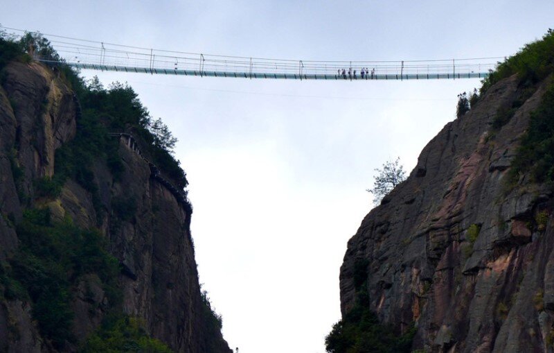 High-altitude glass-bottomed bridge (made of glass) opens in Hunan, China (8)