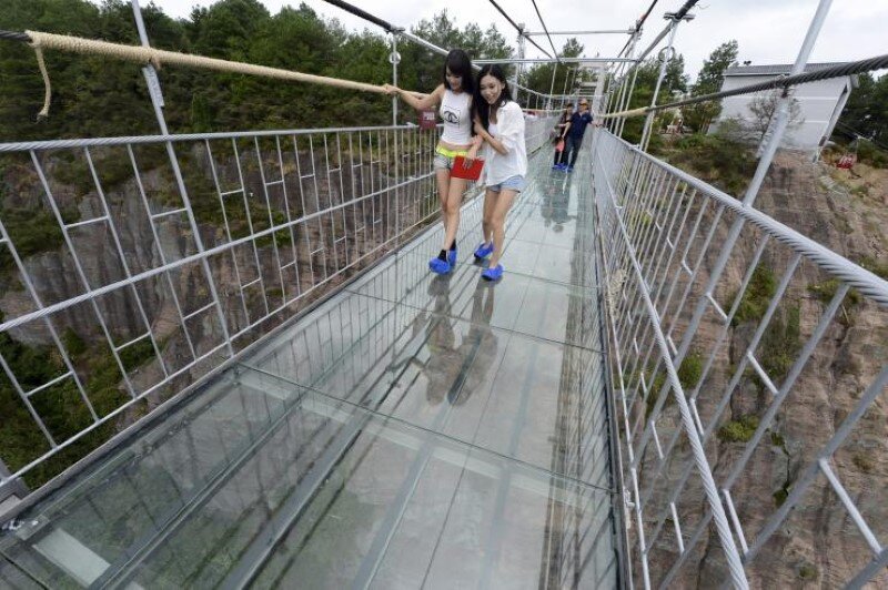 High-altitude glass-bottomed bridge (made of glass) opens in Hunan, China (9)