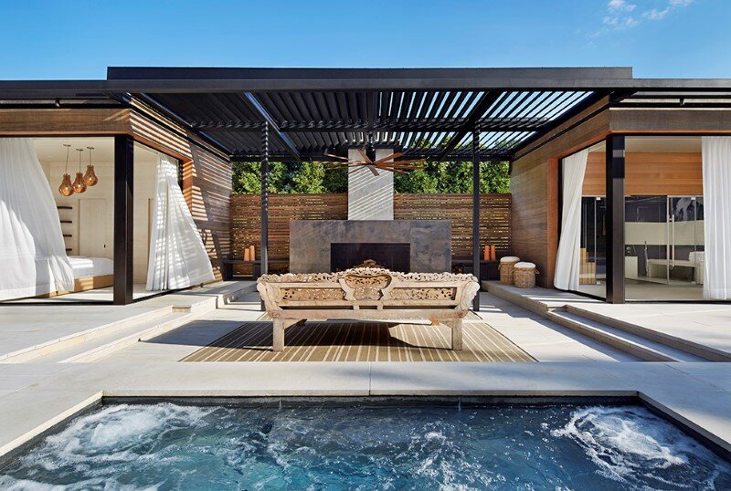 Lavish pool and spa retreat with a stunning wood and steel structure 3