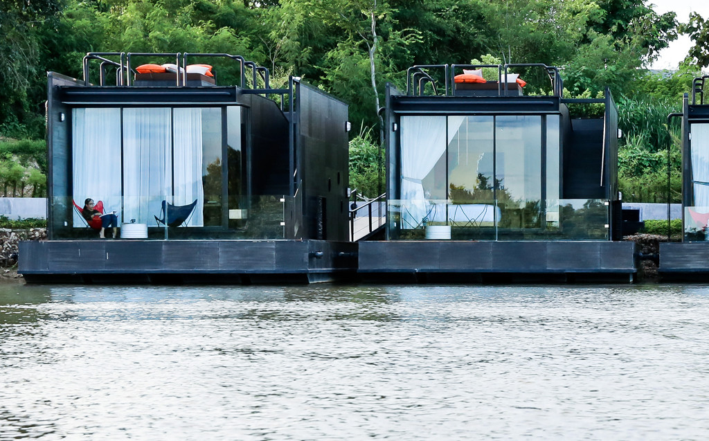 Agaligo Studio have designed - X-Float - a series of floating homes on the River Kwai Bridge, Thailand (1)