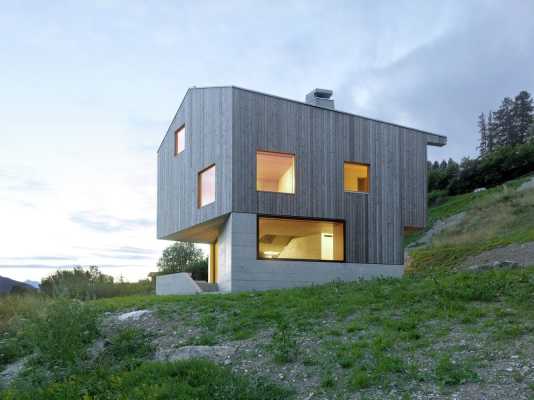 Concrete Cottage Covered with Wood Cladding in the Val d'Hérens