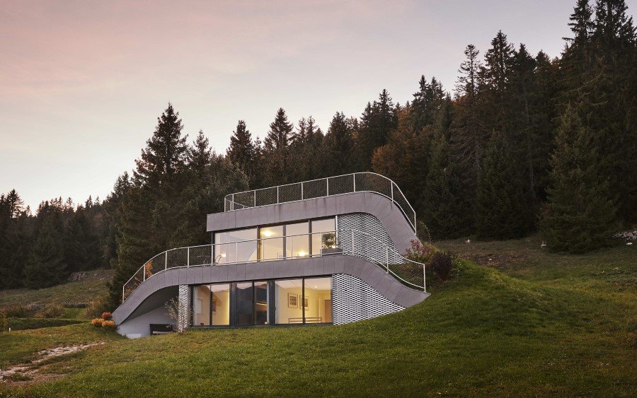 Jura House Blends into the Surrounding Hill (1)