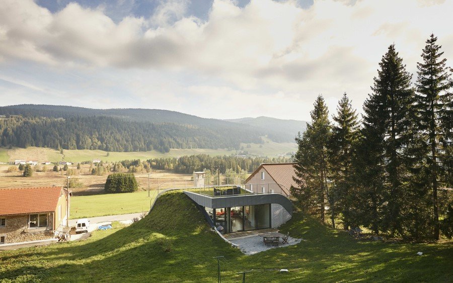 Jura House Blends into the Surrounding Hill (5)