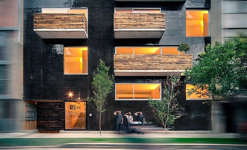 This Apartment Building Has a Black-Reflective Square-Shaped Facade