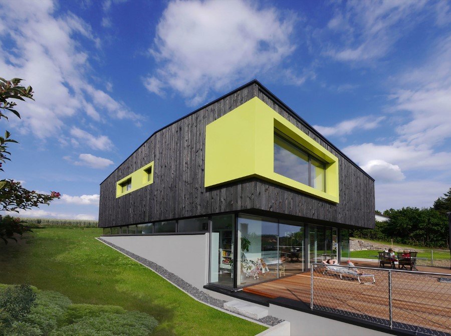 This German Family House is a Black Cuboid Supported by Glass Walls (16)