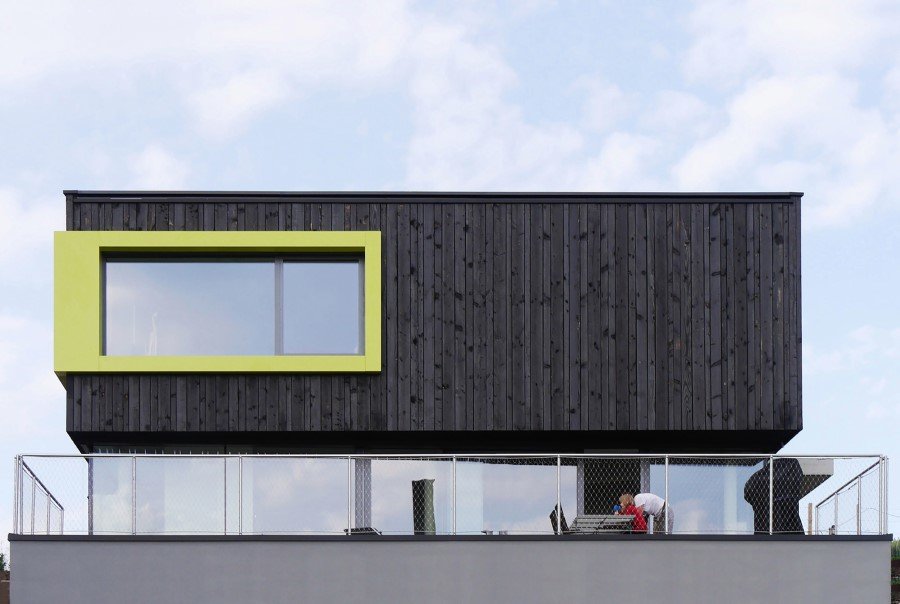 This German Family House is a Black Cuboid Supported by Glass Walls (3)
