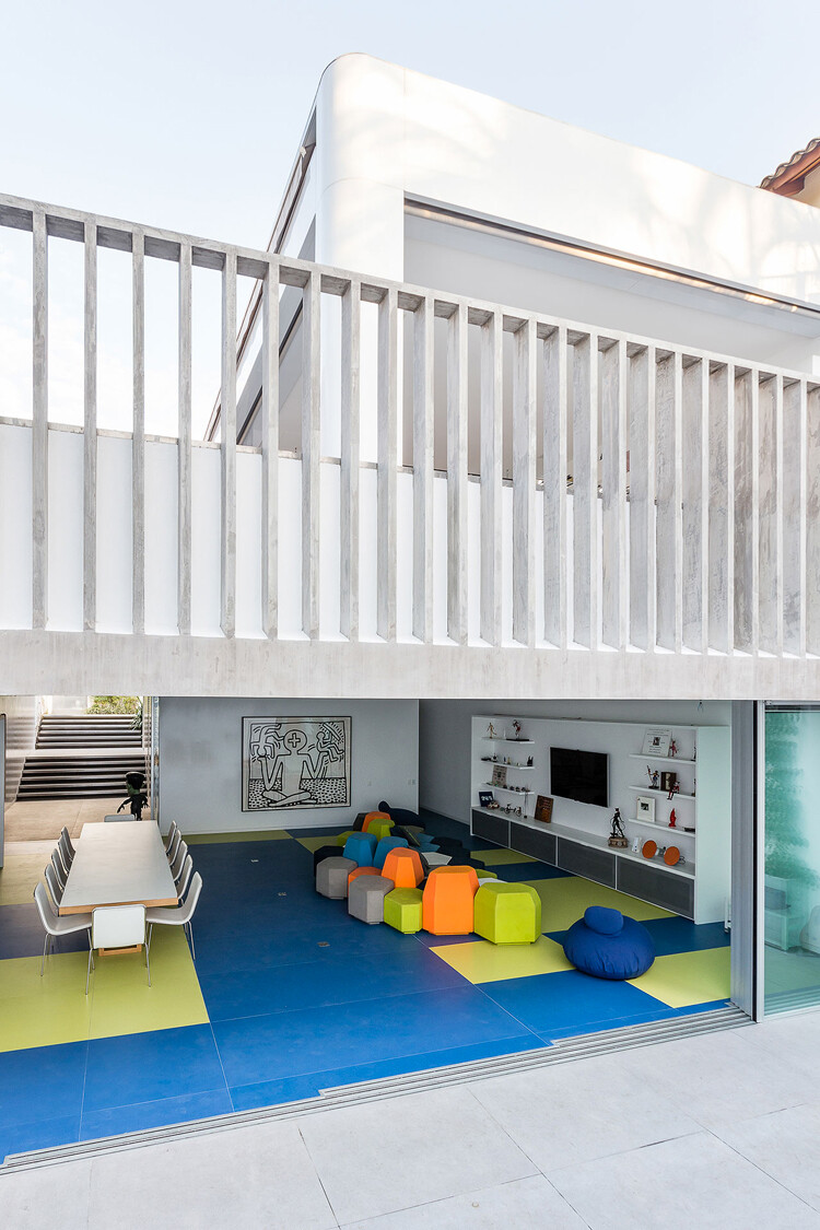 Toy House Was Conceived as a Huge Playground for a Growing Family (9)