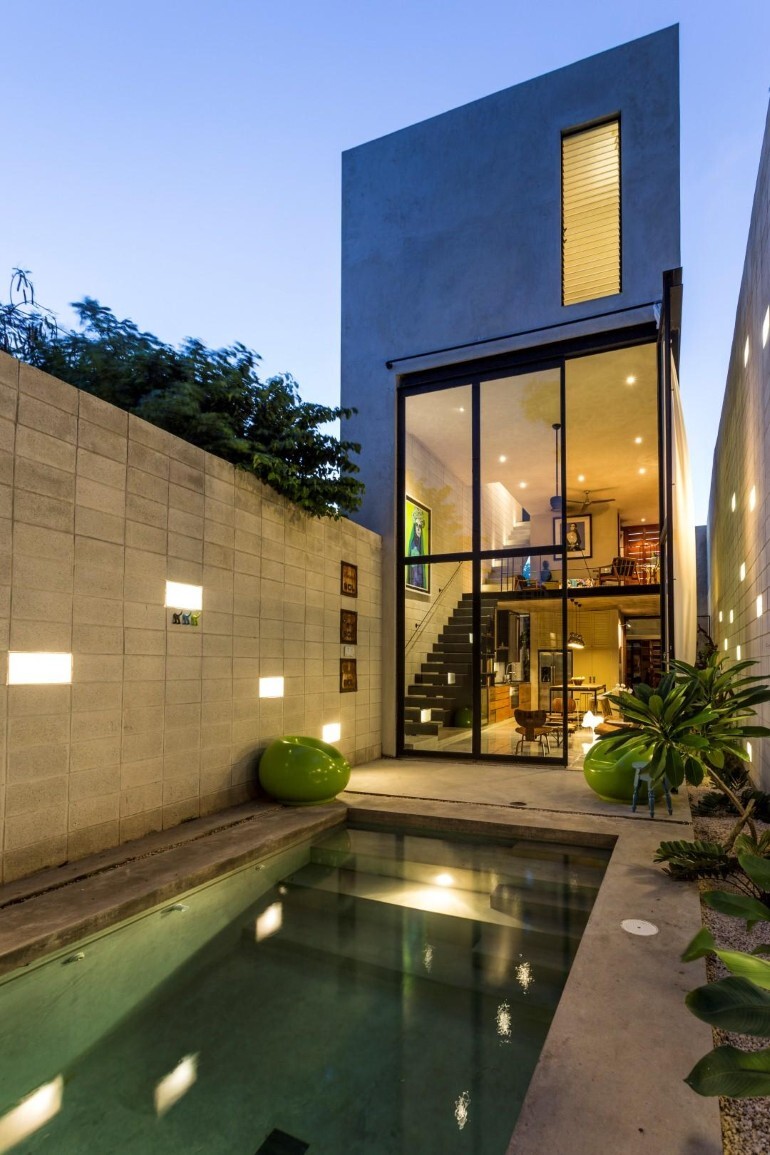 Raw House - Maximizing Vertical Space and Light on a Narrow Lot (1)