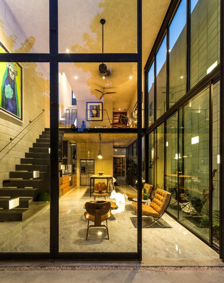 Raw House - Maximizing Vertical Space and Light on a Narrow Lot (20)