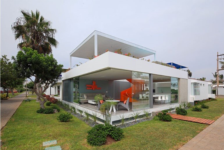 Casa Blanca Has a Striking Orange Staircase That Connects All Indoor Areas (22)