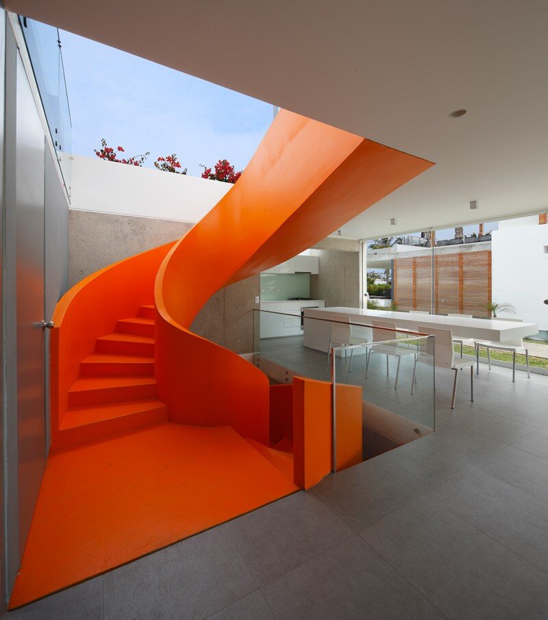 Casa Blanca Has a Striking Orange Staircase That Connects All Indoor Areas (23)