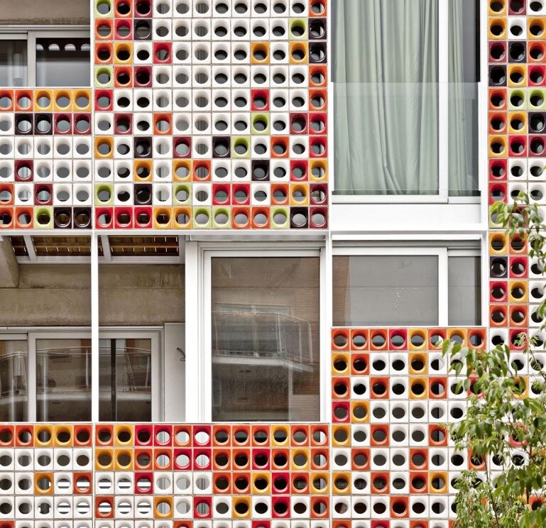 Multifamily Housing Designed with a Shiny Colorful Ceramic Facade