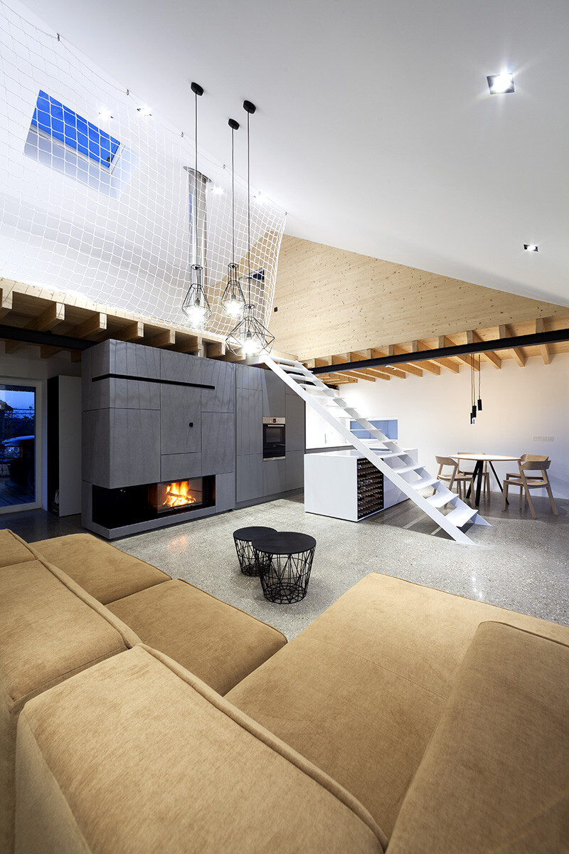 Under the Calvary House Has Traditional Shape and Modern Interiors (10)