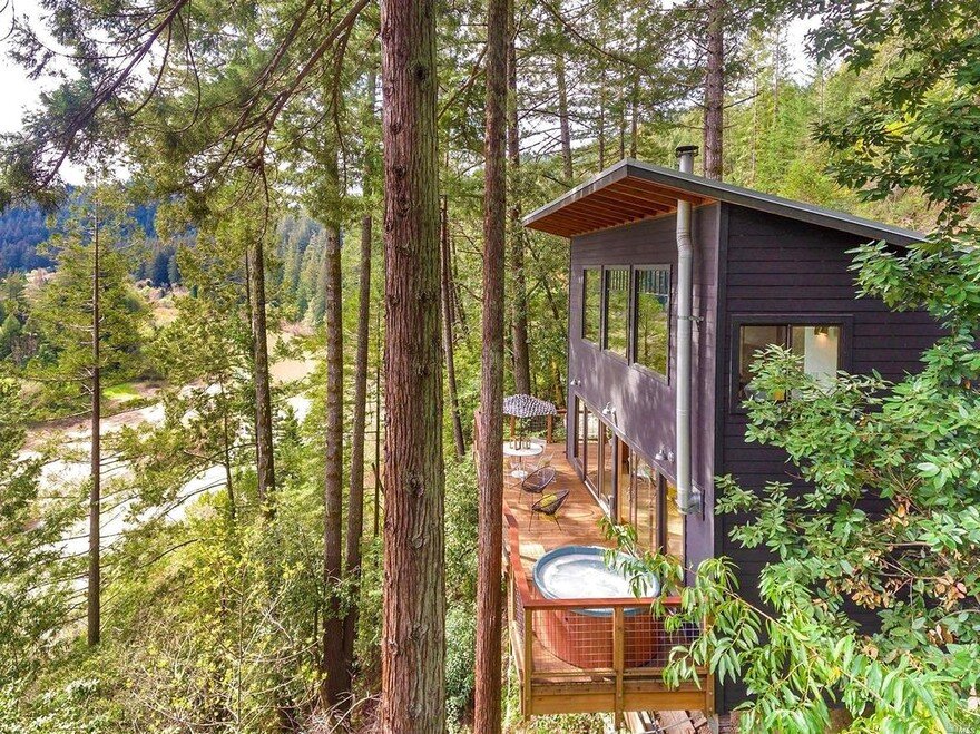 Russian River Cabin with Mid-Century Modern Design 16