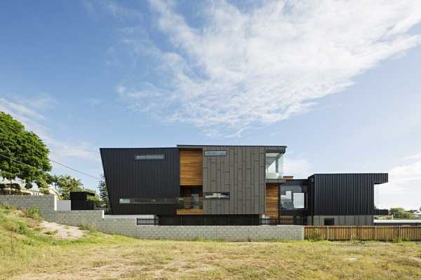 Christian House Has a Large Facade that Allows Generous Shapes and Volumes