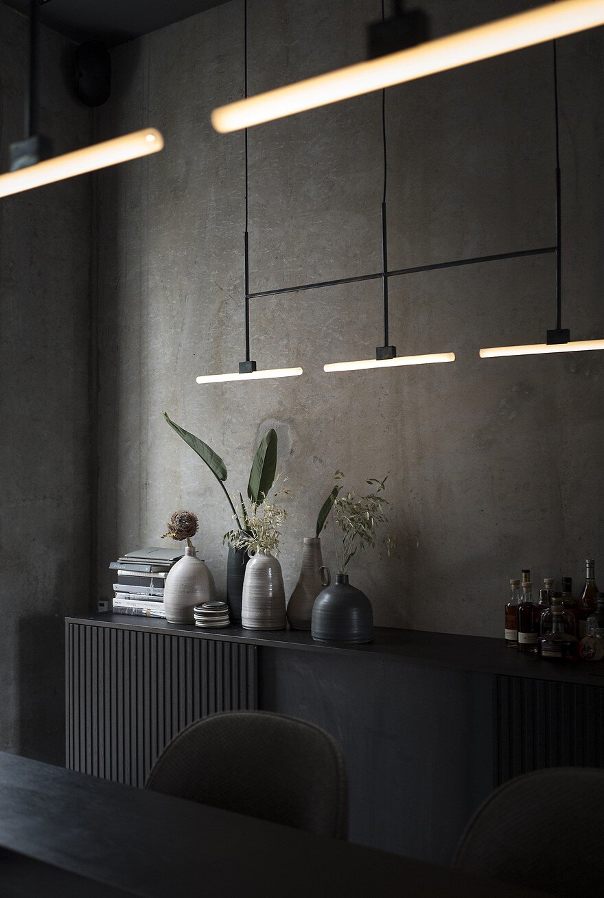 Copenhagen Restaurant Exhibiting Warm and Material Richness Against Raw Concrete Walls 11