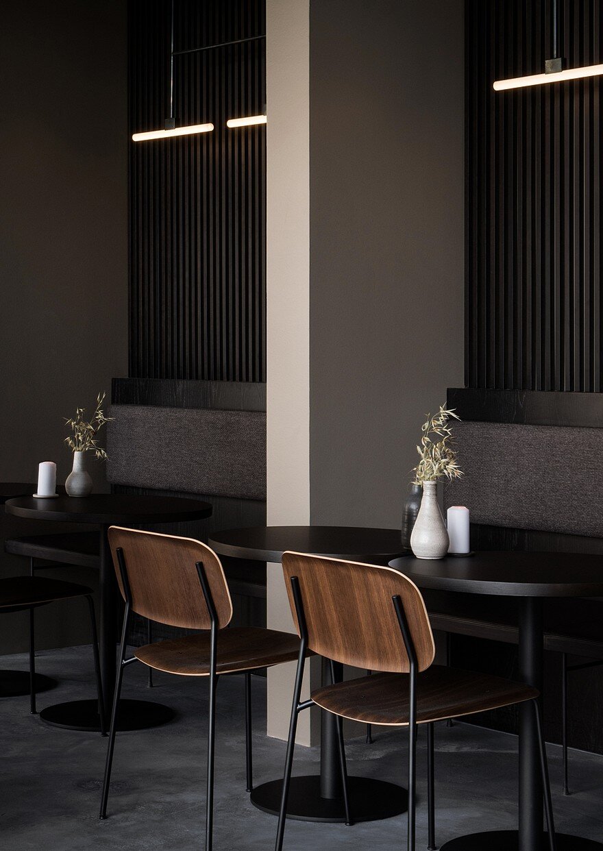 Copenhagen Restaurant Exhibiting Warm and Material Richness Against Raw Concrete Walls 8