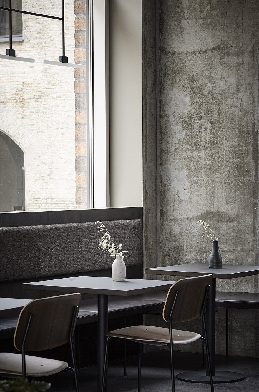 Copenhagen Restaurant Exhibiting Warm and Material Richness Against Raw Concrete Walls 3