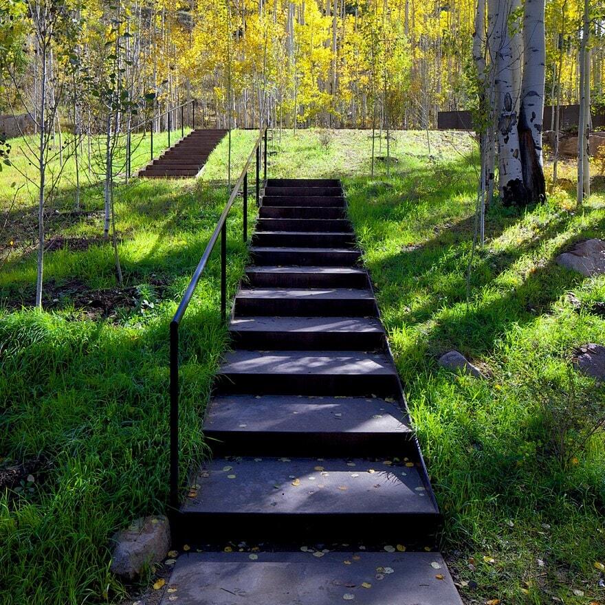 Cottage Black Provides a Retreat Within a Dense Aspen Grove 3