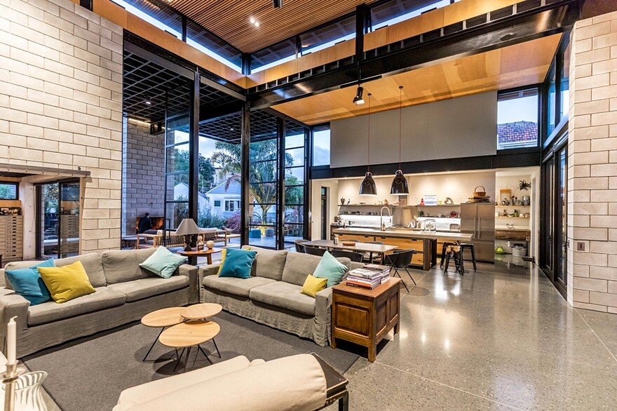 Double Height Living Spaces Add Drama to This Industrial-Style House 3