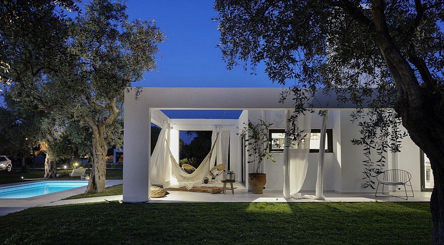 L-Shaped Villa Featuring Large Openings, Clean Surfaces and Bohemian Luxury 18