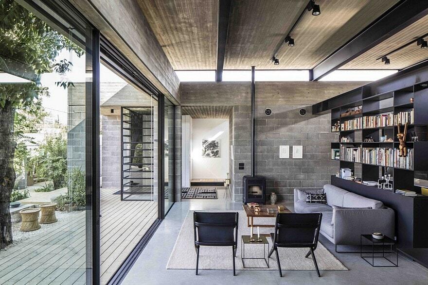 Raw Concrete and Black-Painted Metal Give Industrial Feeling to Jacobs-Yaniv House 4