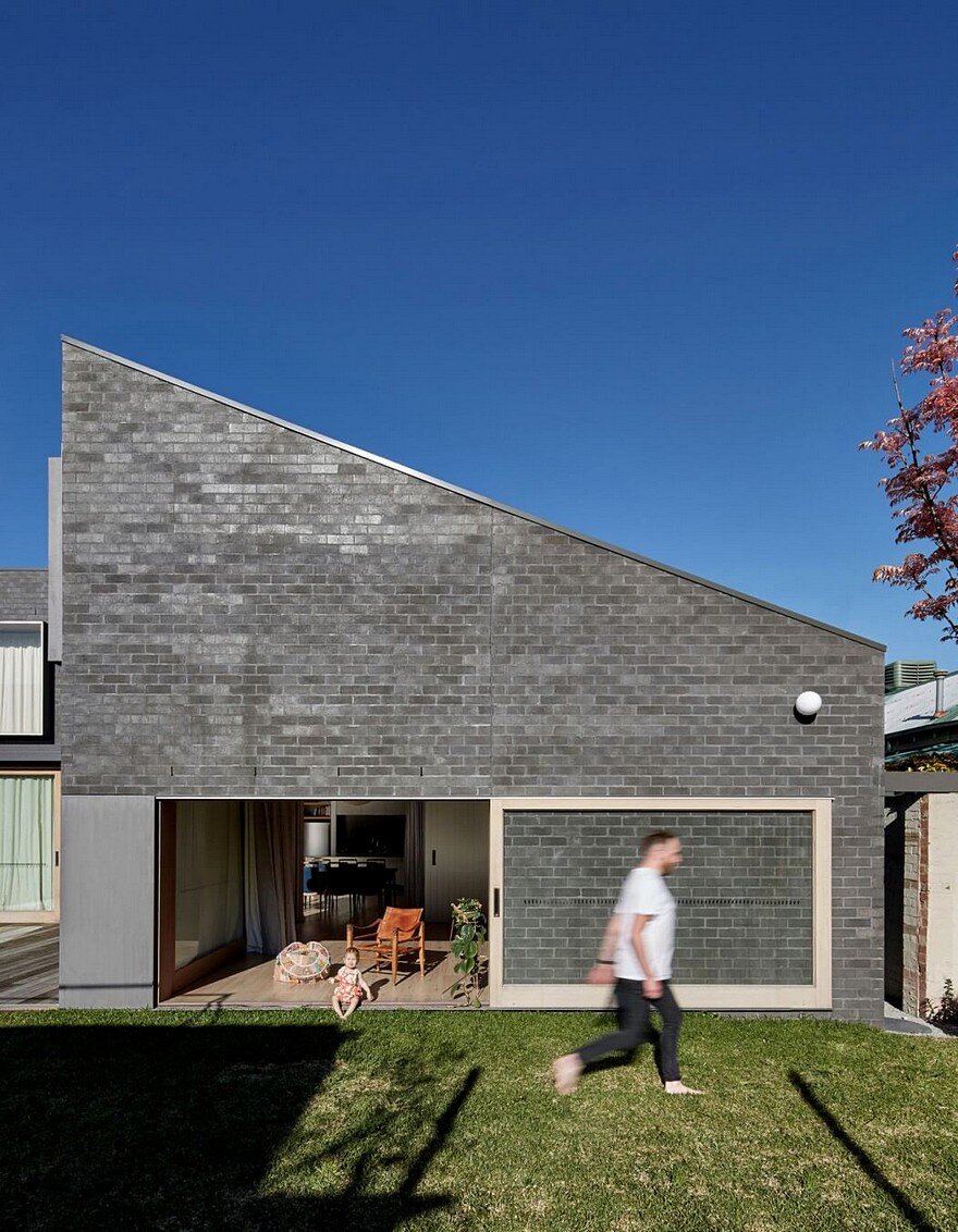 This Black Brick House Features Generous Spaces with a High Degree of Flexibility 9