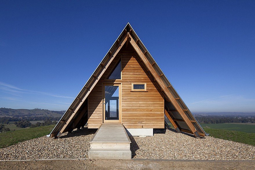 Kimo Hut is an A-Frame-Tent Shape with Two Open Ends and a Corrugated Metal Roof 1
