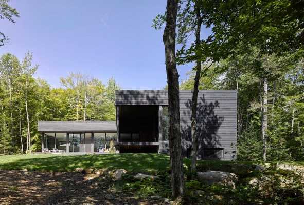 Contemporary Canadian Lake House Features Black Dyed Cedar and Rusted ...