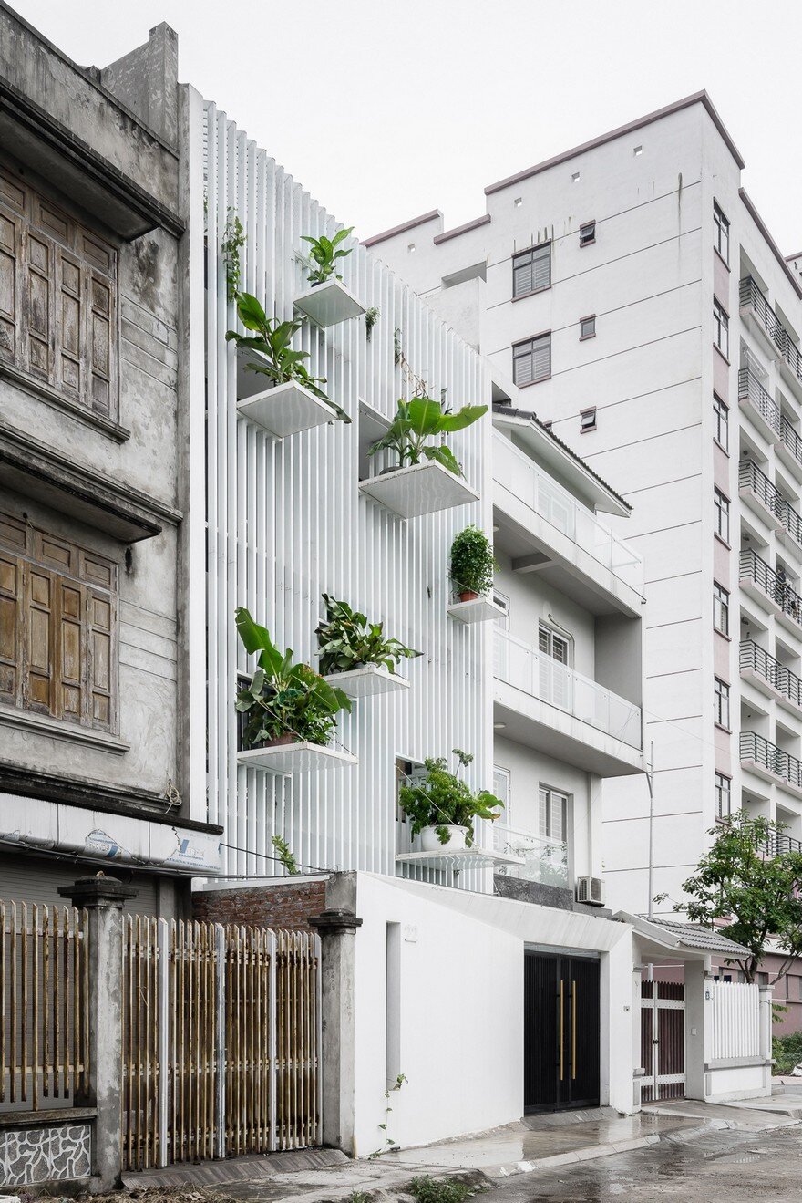 DANstudio Renovates House in Hanoi with Green Balconies Facade