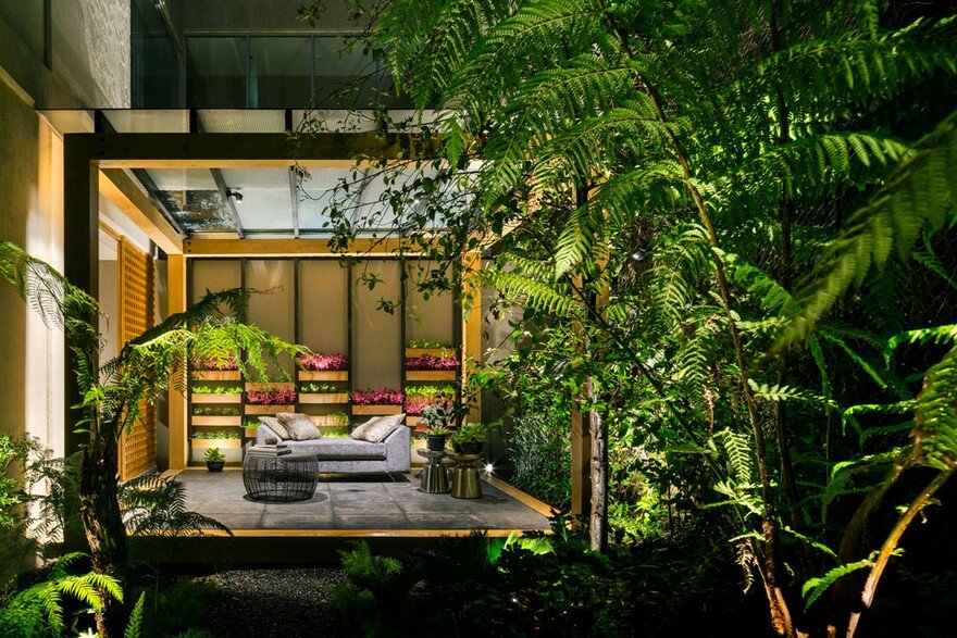 Jardin Apartment Provides a Close Connection of Living Spaces with Patios and Interior Gardens 11
