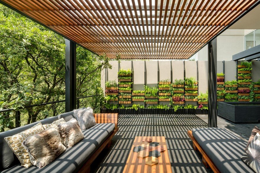 Jardin Apartment Provides a Close Connection of Living Spaces with Patios and Interior Gardens 3