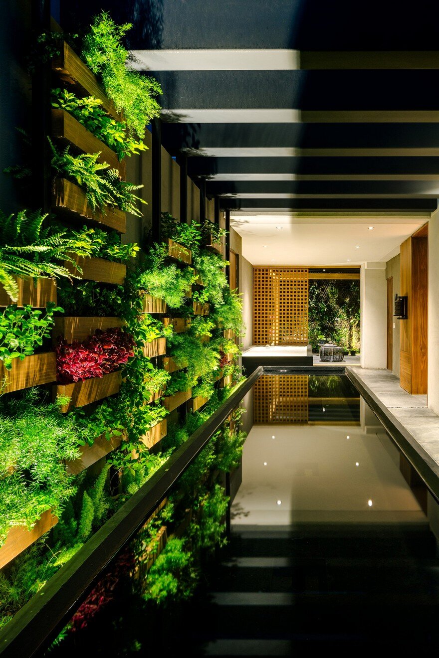 Jardin Apartment Provides a Close Connection of Living Spaces with Patios and Interior Gardens 15