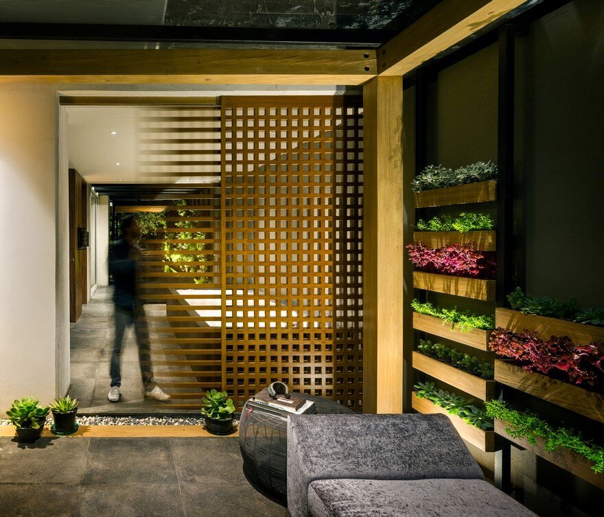 Jardin Apartment Provides a Close Connection of Living Spaces with Patios and Interior Gardens 13