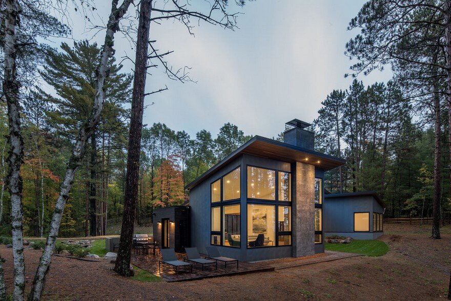 Northern Lake Home Blends into the Forested Landscape 22