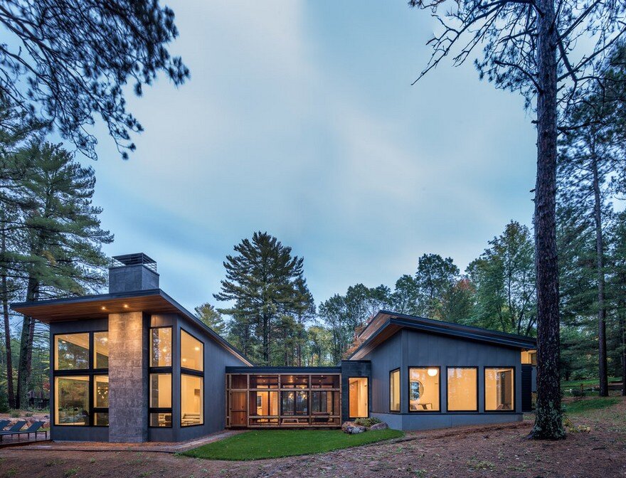 Northern Lake Home Blends into the Forested Landscape 1