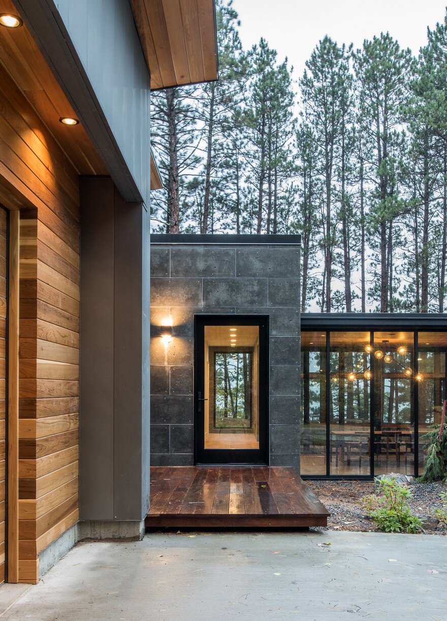 Northern Lake Home Blends into the Forested Landscape 3