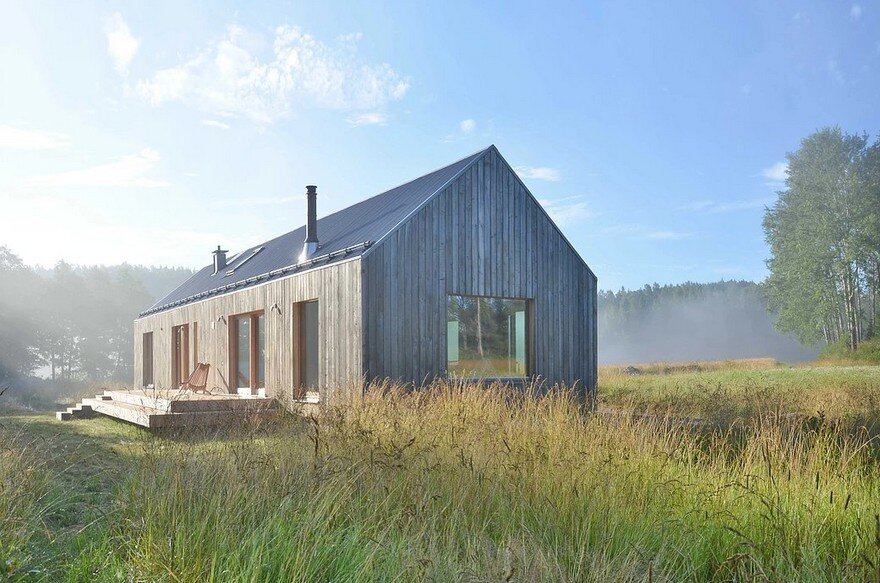 Oblong House is Designed to Sit Naturally in the Open Field Landscape 1