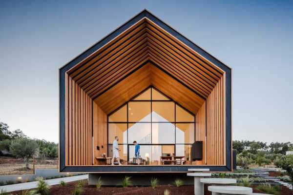 Beautiful Monolithic Home Built of Prefabricated Black Concrete Panels