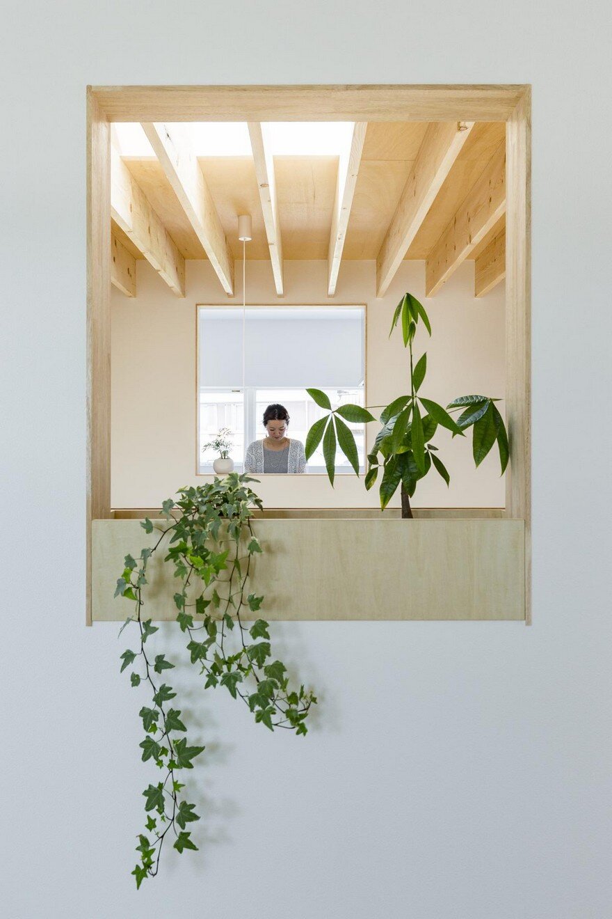 Box-Shaped Japanese Home with Warm Minimalist Interior Design 6