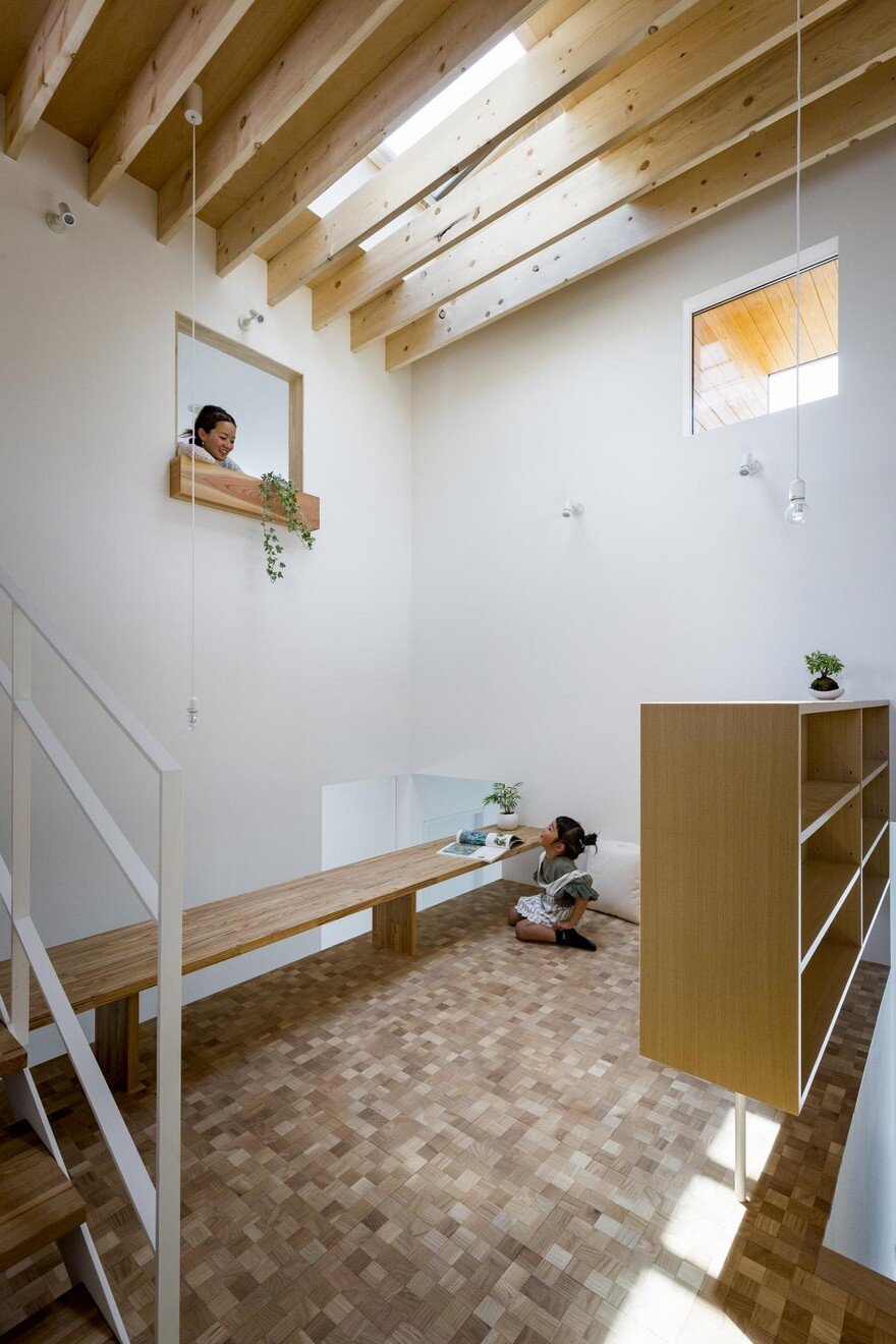 Box-Shaped Japanese Home with Warm Minimalist Interior Design 4