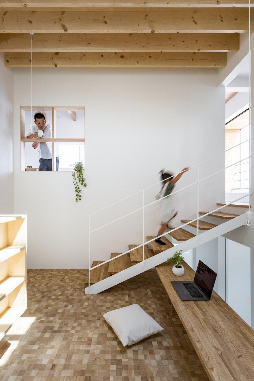 Box-Shaped Japanese Home with Warm Minimalist Interior Design 5