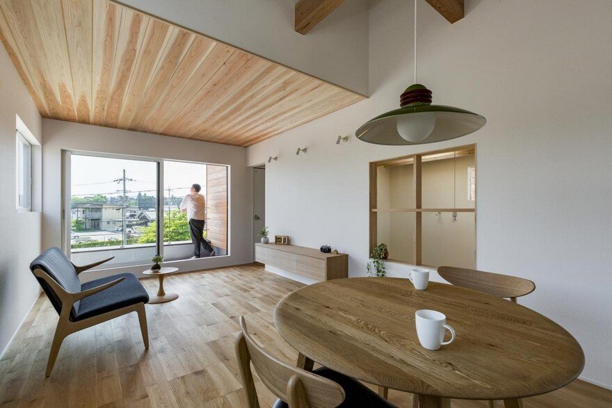 Box-Shaped Japanese Home with Warm Minimalist Interior Design 11