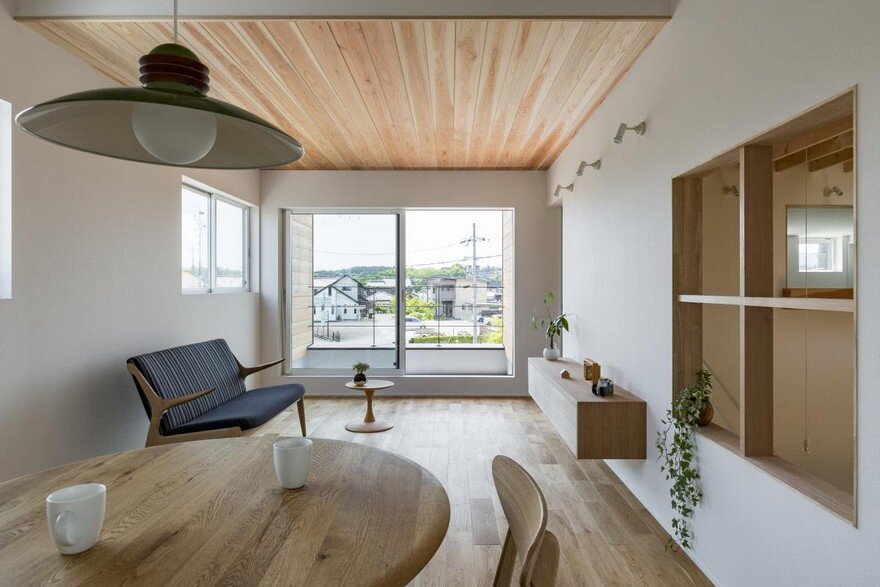 Box-Shaped Japanese Home with Warm Minimalist Interior Design 12