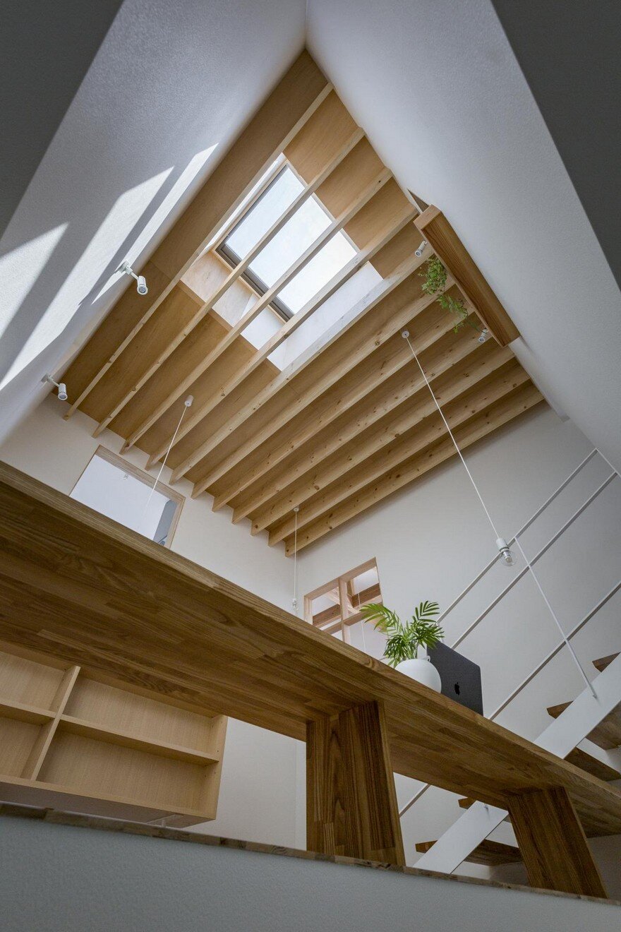 Box-Shaped Japanese Home with Warm Minimalist Interior Design 9