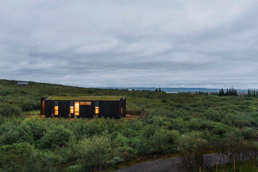 This Rural Cottage in Iceland Have Turf Roofs and Burnt Timber Cladding 14