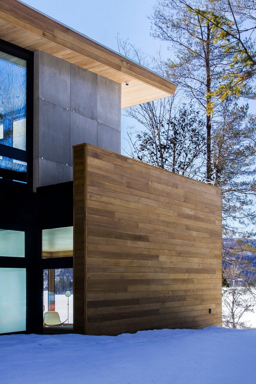 Wooden Wing Cottage in Quebec Perched on a Granite Bedrock 11