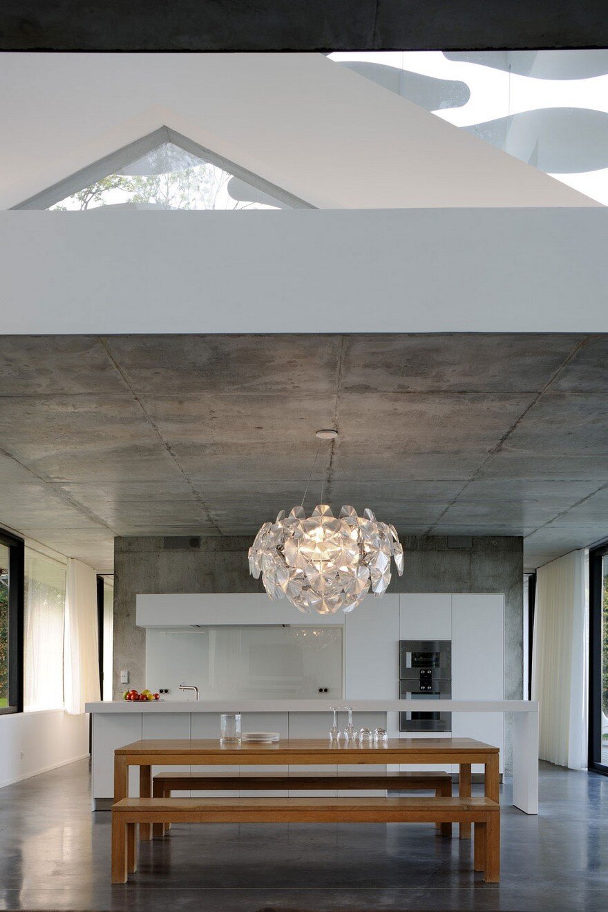 Contemporary Lake House Made Entirely of Raw Concrete 7